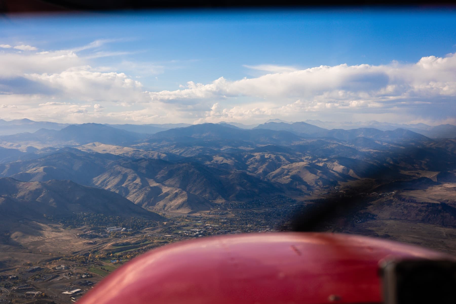 shot from a small prop plane 04 looking at mountains