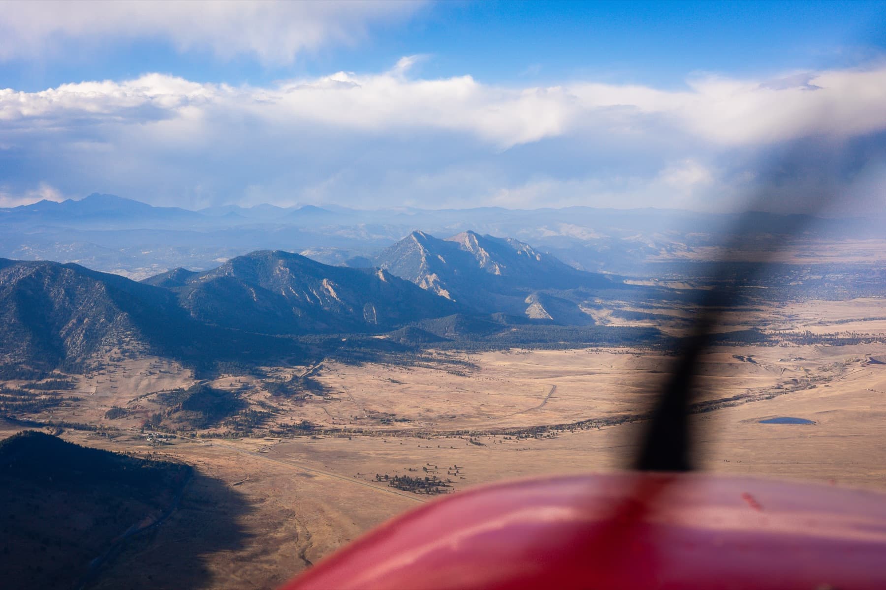 shot from a small prop plane 05 looking at mountains