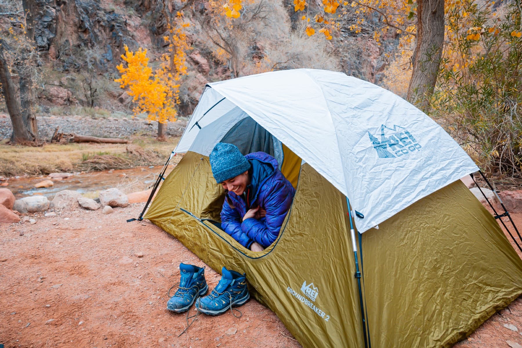 happy camper laughing in tent doorway grand canyon