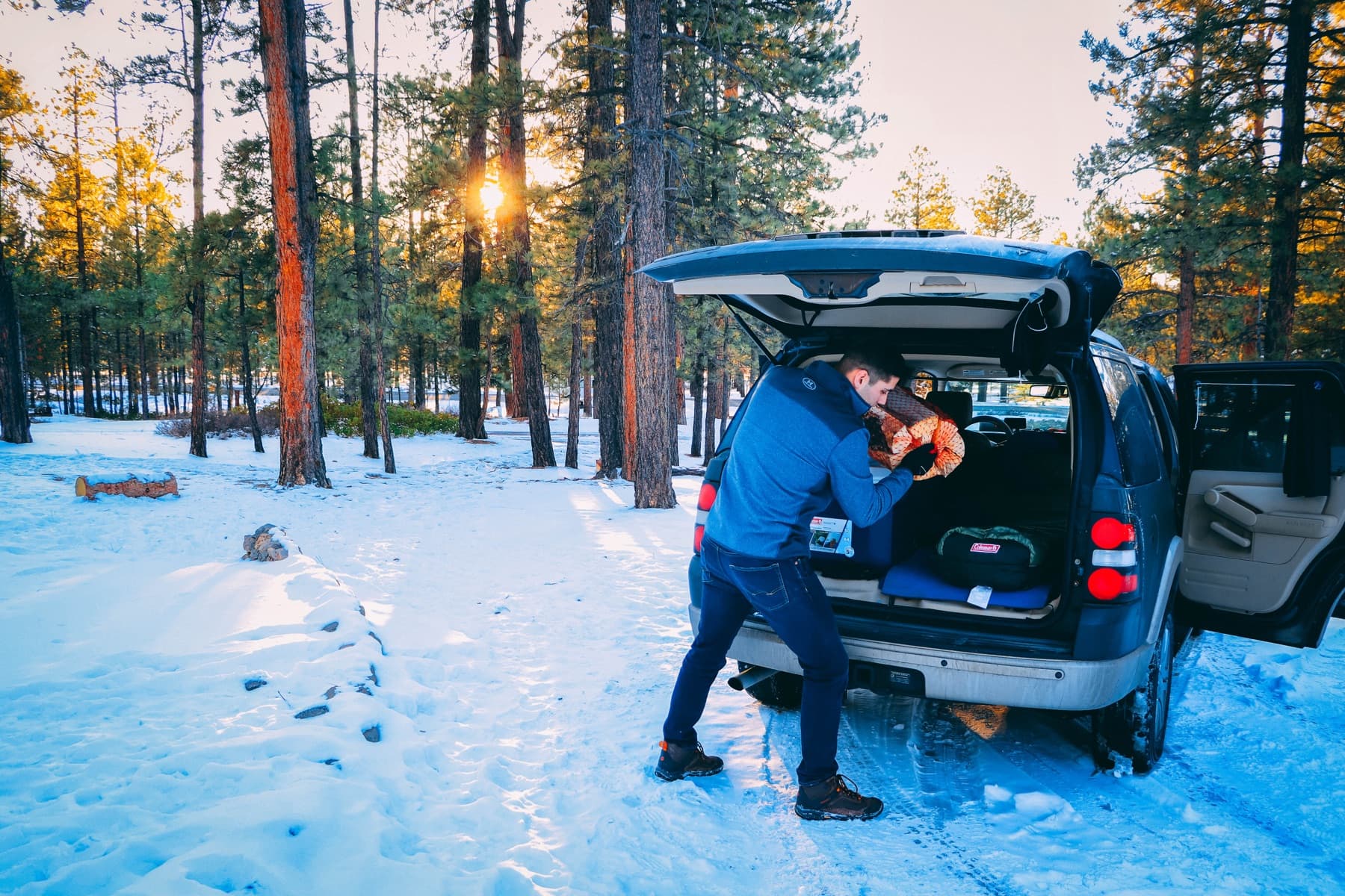utah unloading wood from explorer for camp