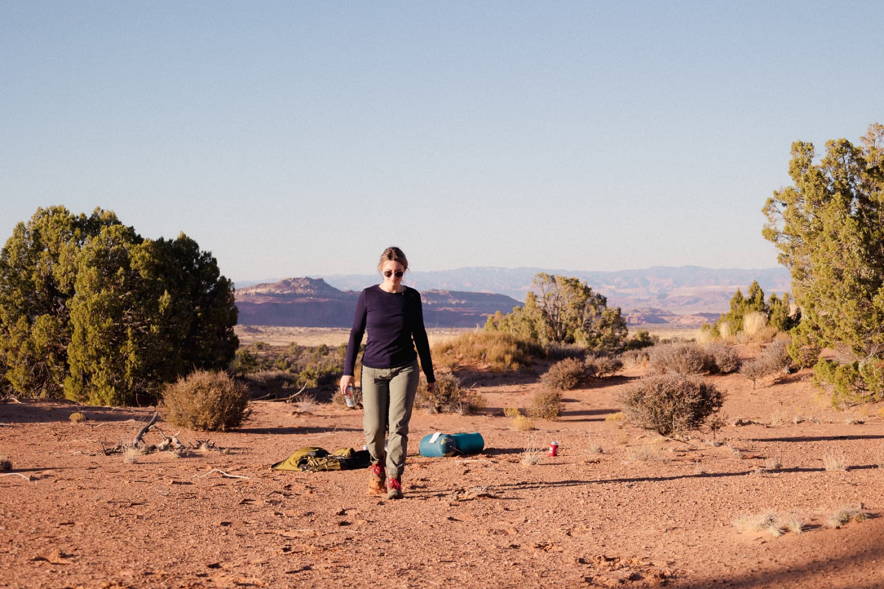 taylor in utah landscape walking away from camp