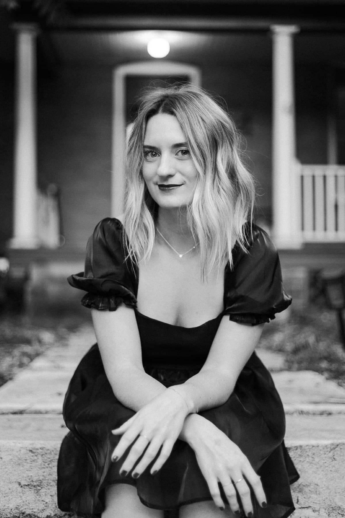 taylor portrait bw out front of colorado house